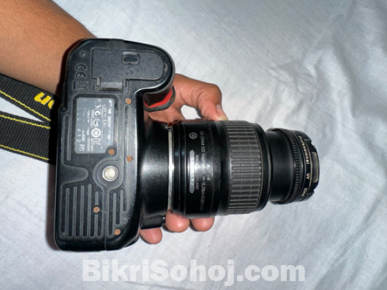 Nikon D3100 with 70-300mm zoom lens and 18-55mm kit lens